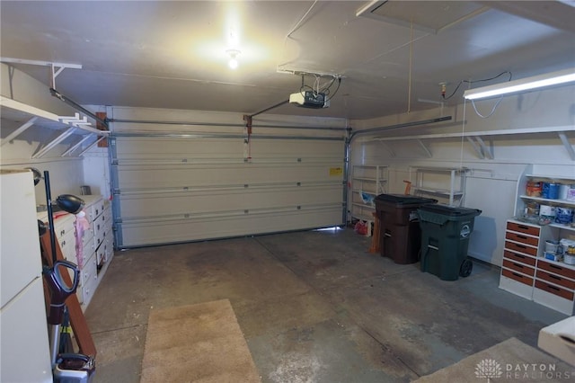 garage featuring a garage door opener