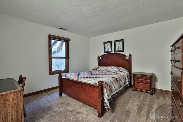439 Claxton Glen Ct, Dayton, OH 45429 - carpeted bedroom with baseboards and a textured ceiling
