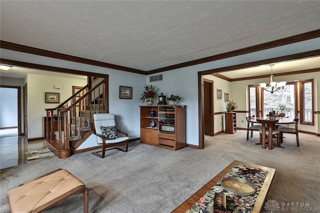 439 Claxton Glen Ct, Dayton, OH 45429 - carpeted living area featuring a chandelier, stairway, ornamental molding, a textured ceiling, and baseboards