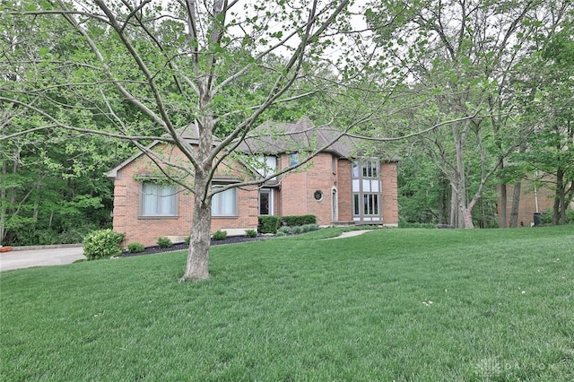 439 Claxton Glen Ct, Dayton, OH 45429 - view of front facade with brick siding and a front lawn