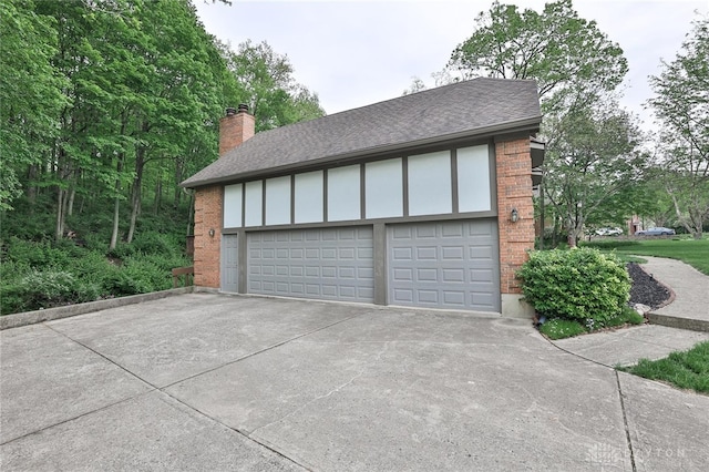 439 Claxton Glen Ct, Dayton, OH 45429 - garage featuring driveway
