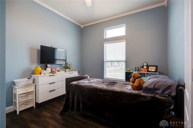 bedroom with dark wood-style floors, baseboards, a ceiling fan, and crown molding