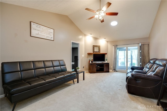 living area featuring light carpet, high vaulted ceiling, a ceiling fan, and baseboards