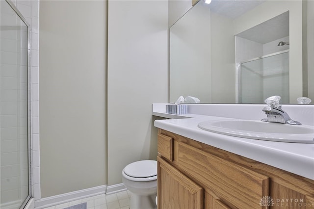 full bathroom with toilet, a stall shower, tile patterned flooring, and vanity