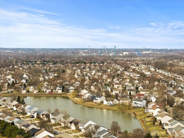 bird's eye view featuring a water view and a residential view