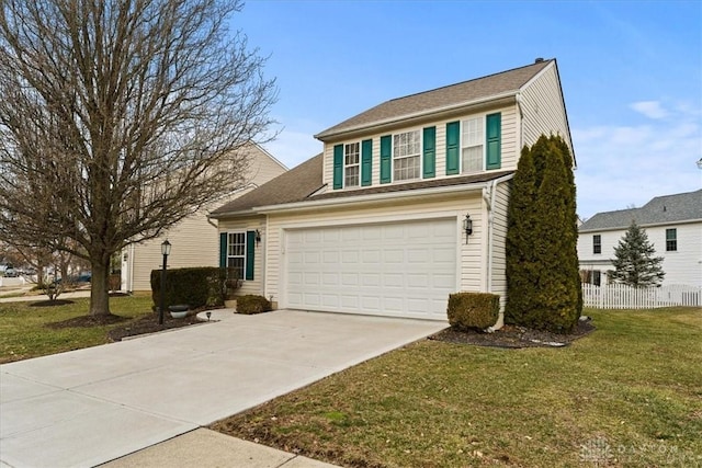 traditional-style home with driveway, a front yard, and fence