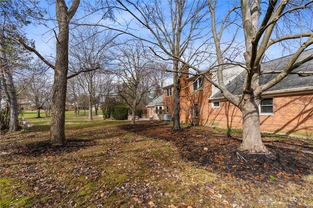 view of yard with central AC