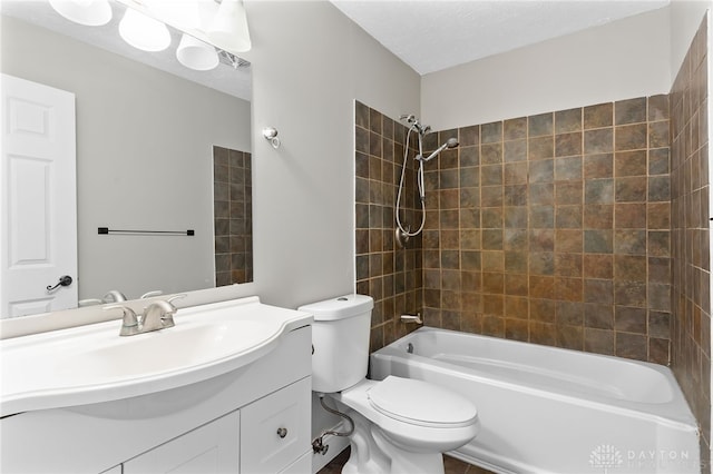 full bath featuring toilet, vanity, and bathing tub / shower combination