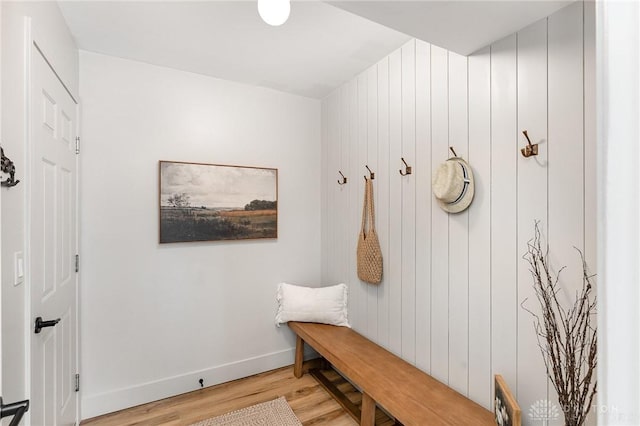 mudroom with light wood-style flooring and baseboards