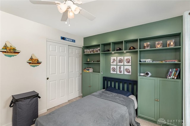 bedroom featuring a ceiling fan and a closet