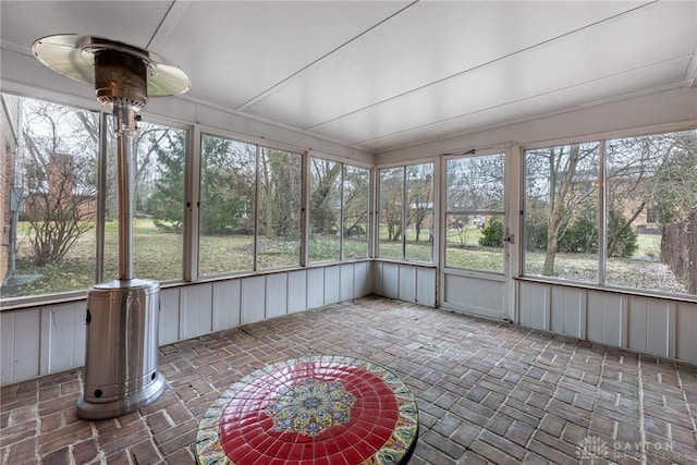 unfurnished sunroom with a healthy amount of sunlight