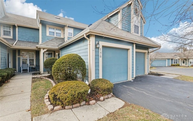 view of front of property with driveway and an attached garage