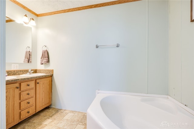 bathroom featuring a textured ceiling, double vanity, a sink, and a washtub