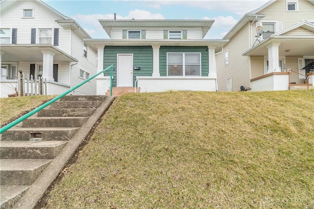 view of front of property featuring a front yard