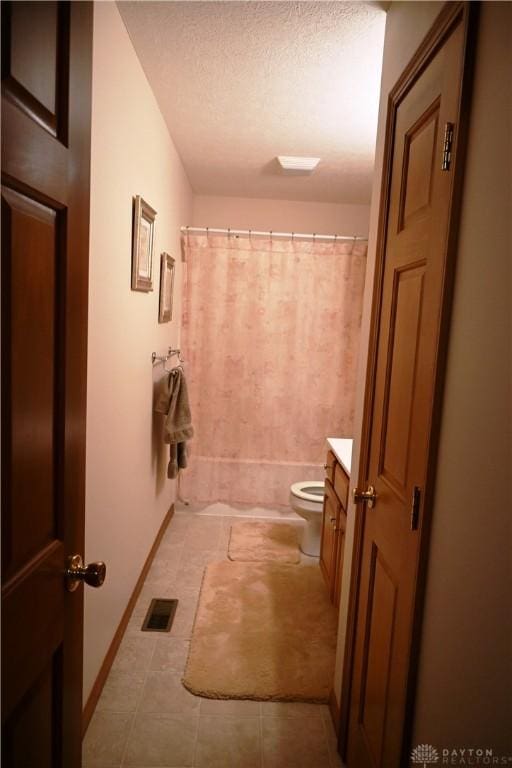 full bath featuring a textured ceiling, toilet, shower / tub combo, vanity, and visible vents