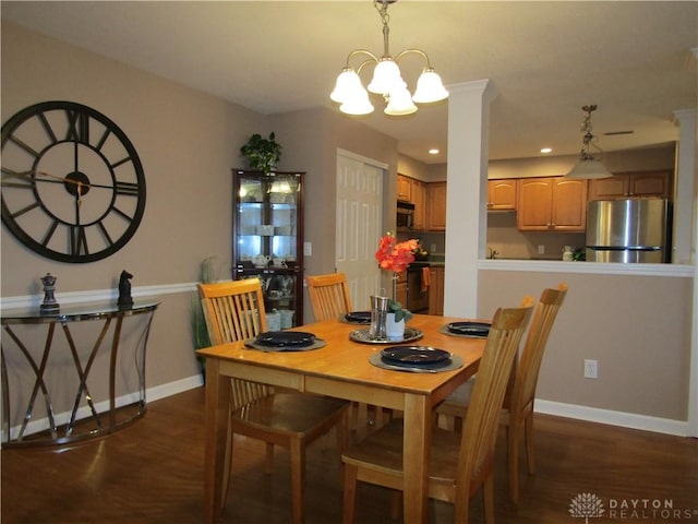 dining space with recessed lighting, dark wood finished floors, and baseboards