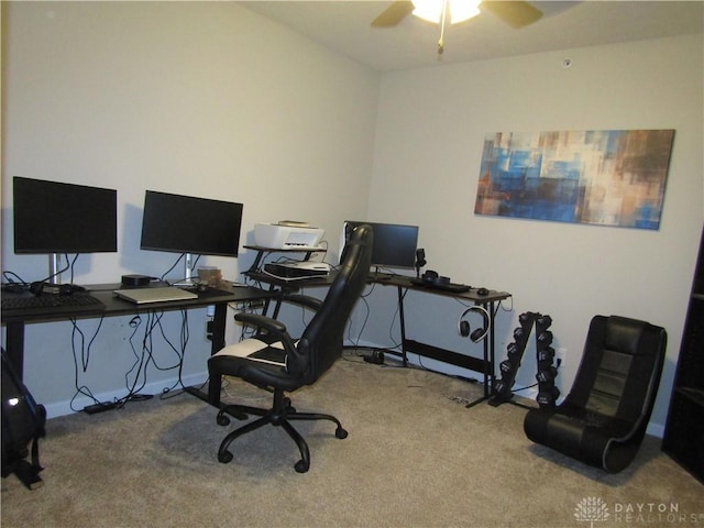 carpeted office with ceiling fan