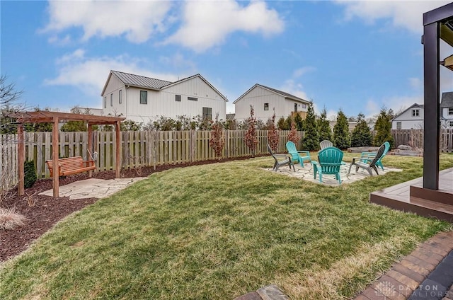 view of yard featuring a patio area, a fenced backyard, and a pergola