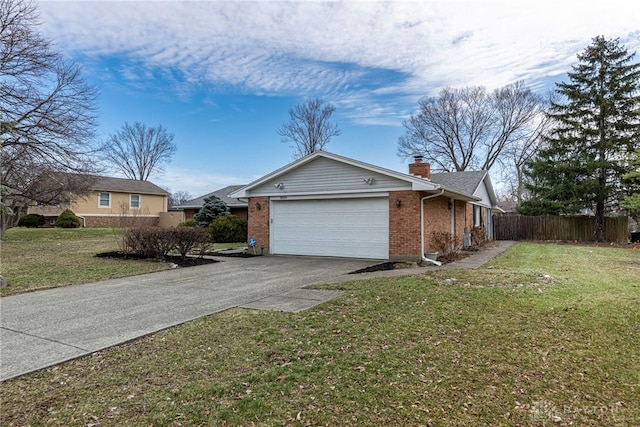 view of side of property featuring driveway, a chimney, an attached garage, fence, and brick siding