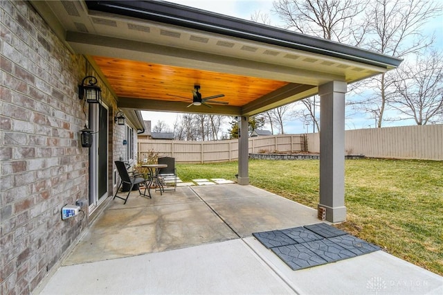 view of patio / terrace featuring a fenced backyard and a ceiling fan