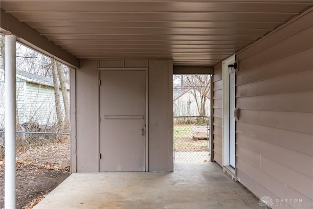 view of patio featuring fence