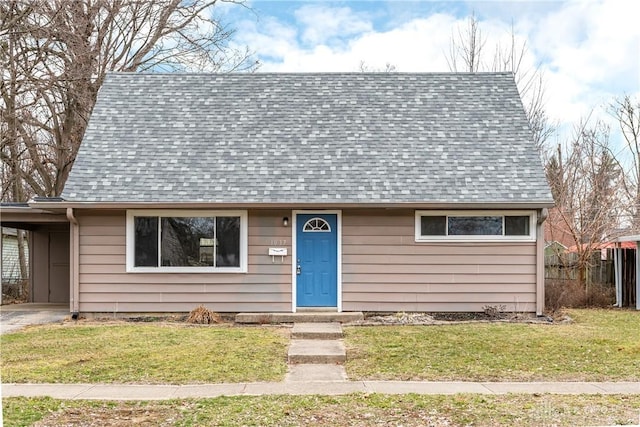 view of front facade with driveway, a shingled roof, a front lawn, and an attached carport