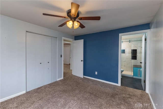 unfurnished bedroom featuring carpet floors, a closet, baseboards, and ensuite bathroom