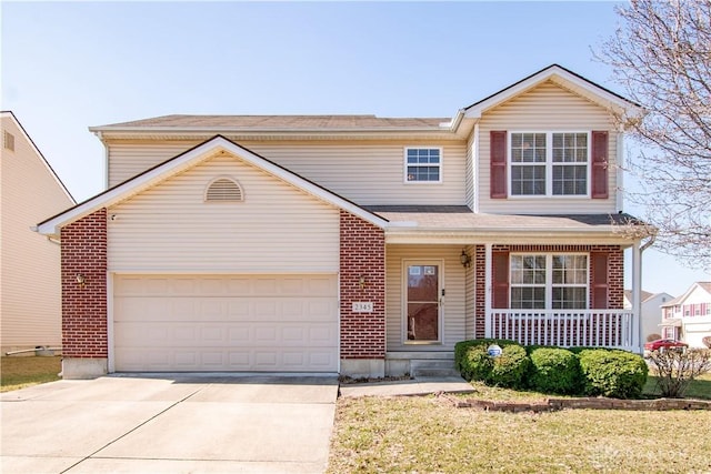 traditional home with a porch, brick siding, driveway, and an attached garage