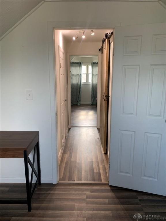 147 Mccraw Dr, Englewood, OH 45322 - hallway featuring dark wood finished floors and a barn door