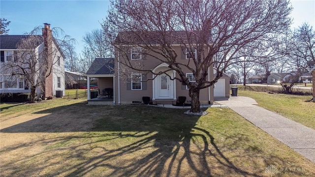 view of front facade with a garage, a front yard, concrete driveway, and entry steps