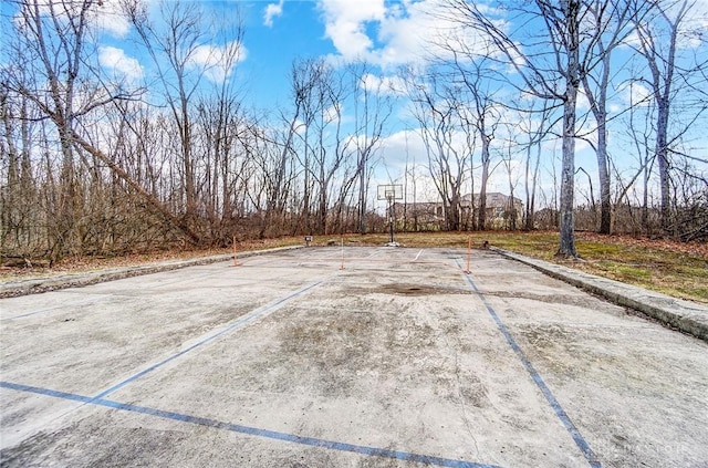 view of yard with community basketball court