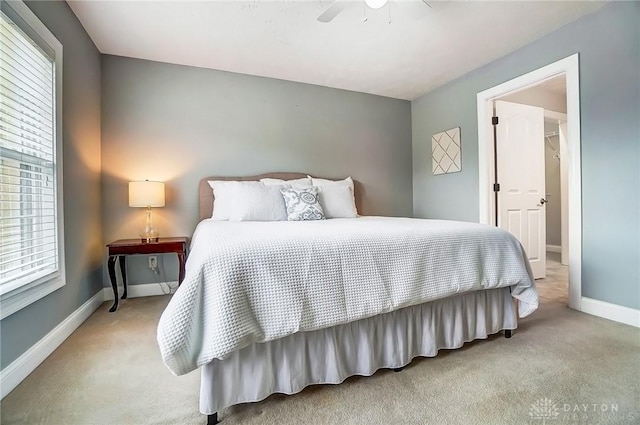 bedroom featuring carpet floors, ceiling fan, and baseboards