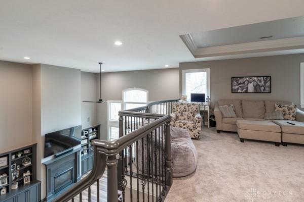 carpeted living area featuring recessed lighting