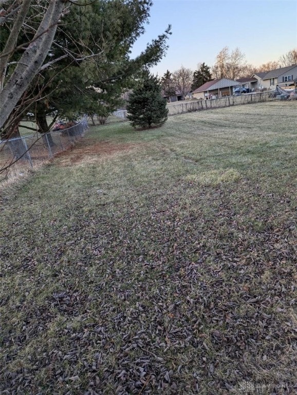 view of yard with fence