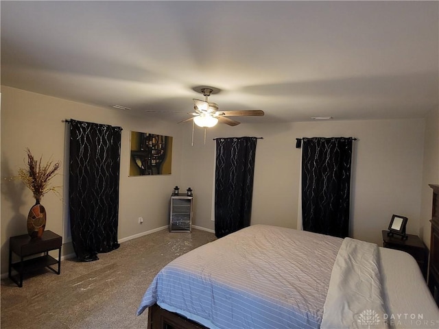 bedroom featuring baseboards, carpet, and a ceiling fan