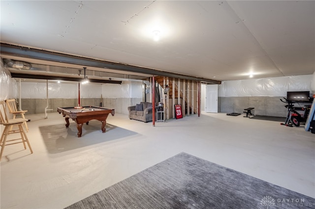 unfinished basement featuring billiards