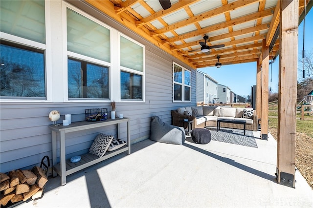 view of patio featuring outdoor lounge area and ceiling fan