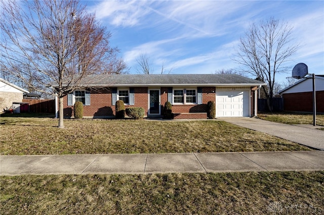 ranch-style home with fence, driveway, a front lawn, a garage, and brick siding