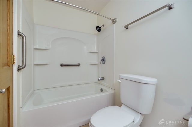 bathroom featuring toilet and washtub / shower combination