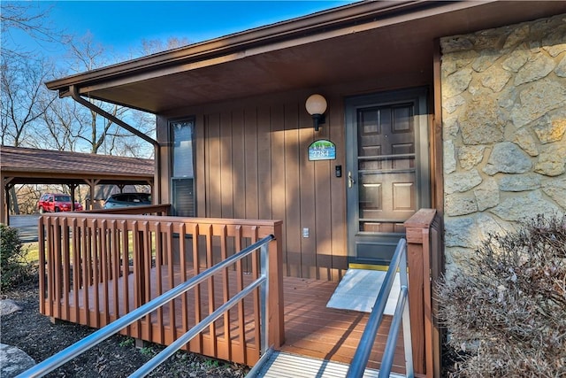 doorway to property with stone siding