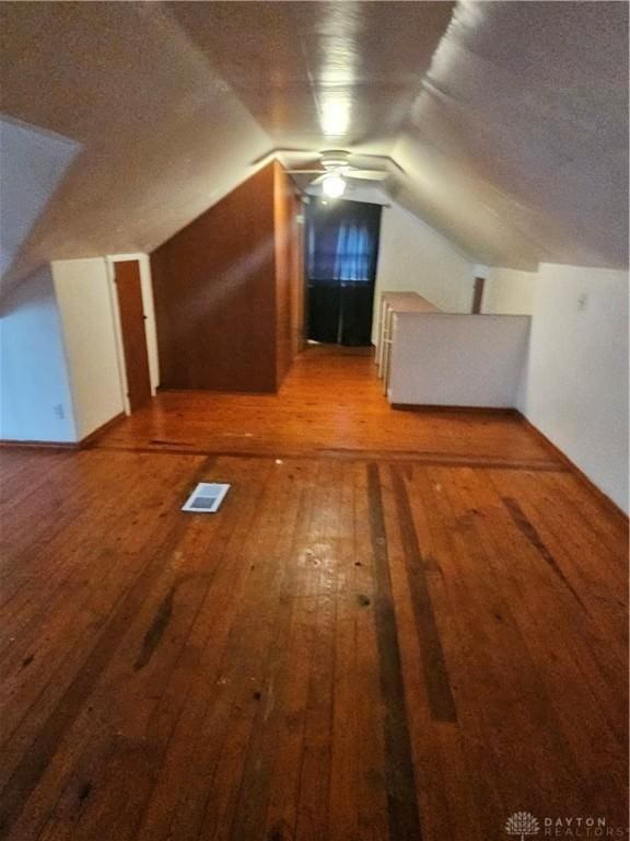 25 Redwood Ave, Dayton, OH 45405 - bonus room with a ceiling fan, vaulted ceiling, hardwood / wood-style floors, and visible vents
