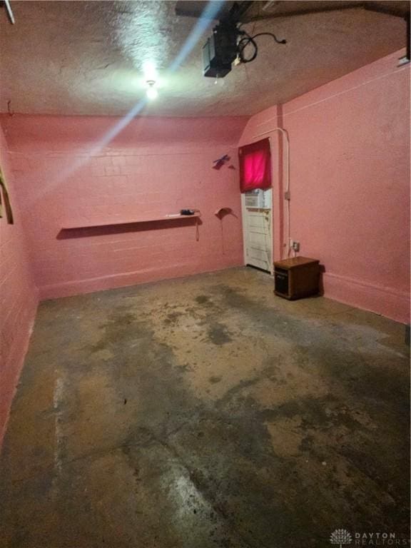 25 Redwood Ave, Dayton, OH 45405 - garage featuring a garage door opener and ceiling fan