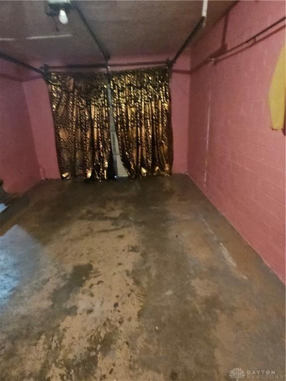 25 Redwood Ave, Dayton, OH 45405 - garage featuring concrete block wall