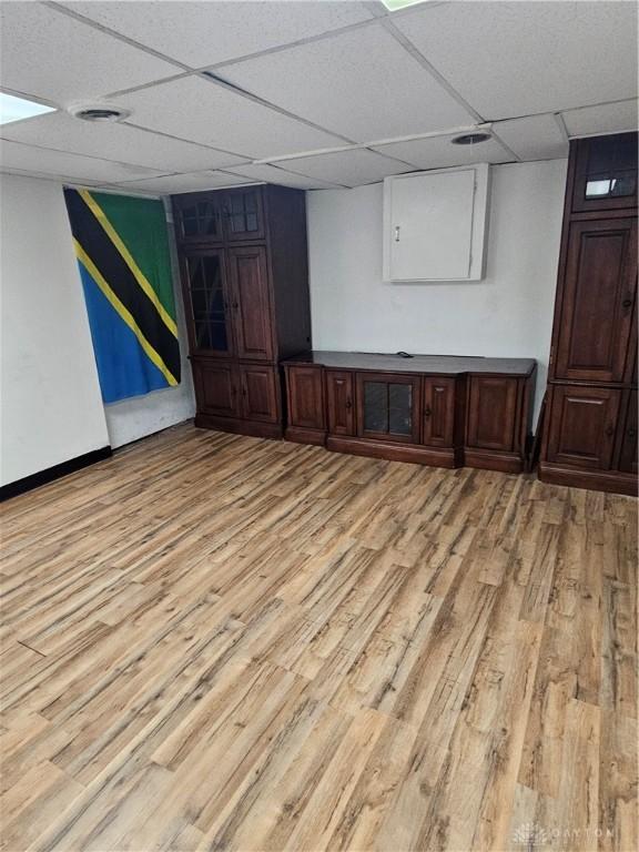 25 Redwood Ave, Dayton, OH 45405 - finished below grade area featuring baseboards, a drop ceiling, and light wood finished floors