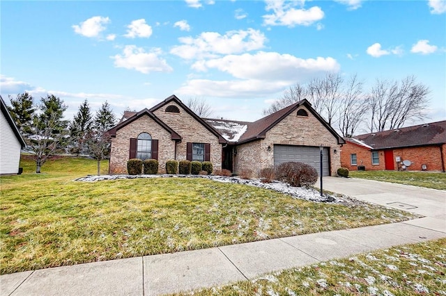 view of front of house featuring brick siding, a garage, concrete driveway, and a front yard