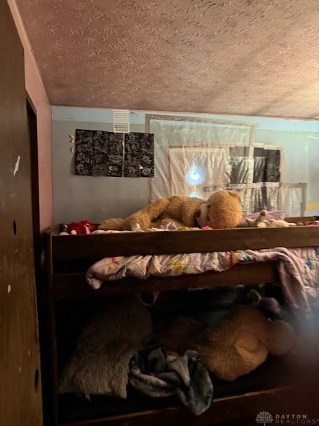 bedroom with a textured ceiling