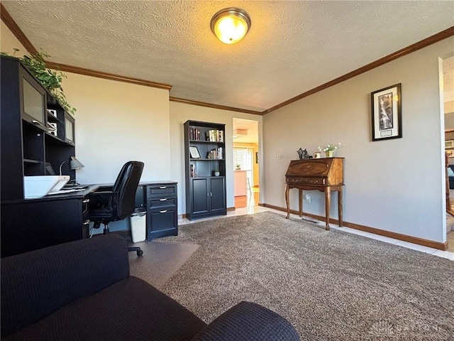 carpeted office with a textured ceiling, crown molding, and baseboards