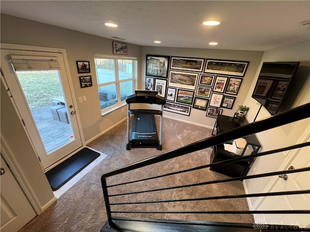 stairs with recessed lighting, baseboards, and carpet floors