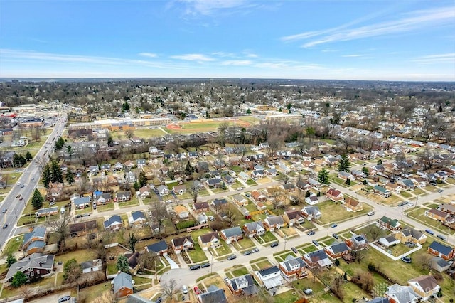 birds eye view of property with a residential view