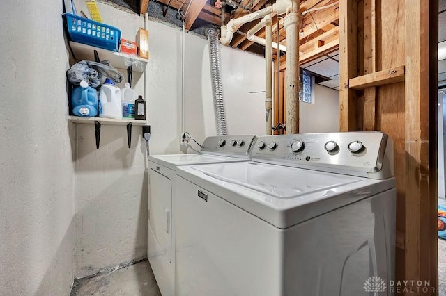 laundry area featuring laundry area and washer and clothes dryer